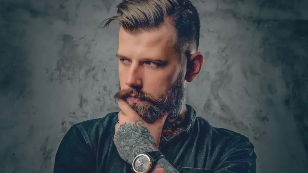 Barber podczas pielęgnacji brody klienta – pielęgnacja brody krok po kroku